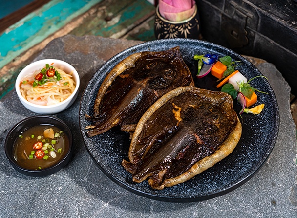 Grilled Ray Fish Served with Green Mango and Tamarind Sauce