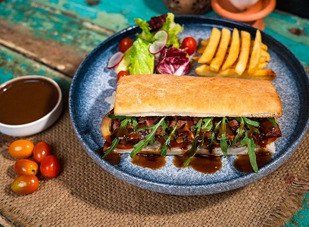 Steak Sandwich with French Fries and Side Salad